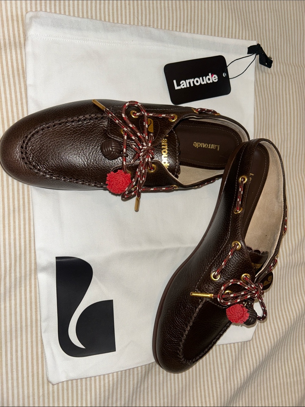 Larroude Cyprus Brown Leather Mule with Red Tassel Accent